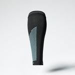 Back view of a black compression calf sleeve with blue details. 