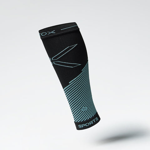 Front view of a black compression calf sleeve with blue details. 