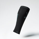 Side view of a black compression calf sleeve with blue details. 